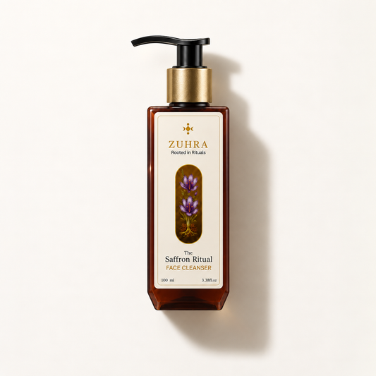 ZUHRA Saffron Face Cleanser in a 100ml amber bottle, flat lay