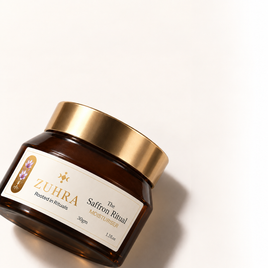 ZUHRA Saffron Face Moisturiser jar, angled, showing The Saffron Ritual label
