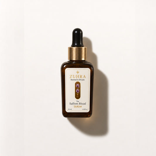 ZUHRA Saffron Serum in a 30ml amber glass bottle, flat lay