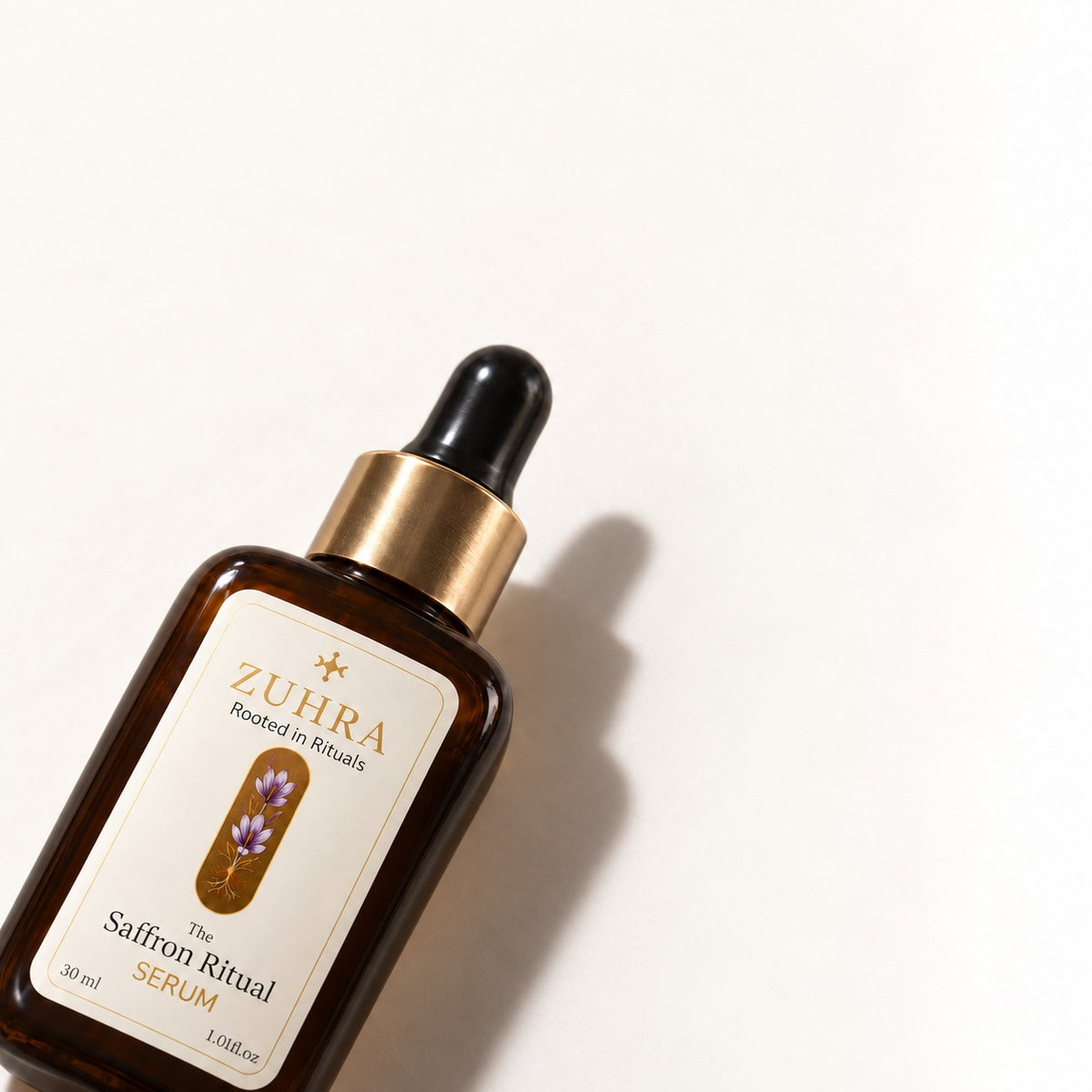 ZUHRA Saffron Serum bottle with dropper, angled